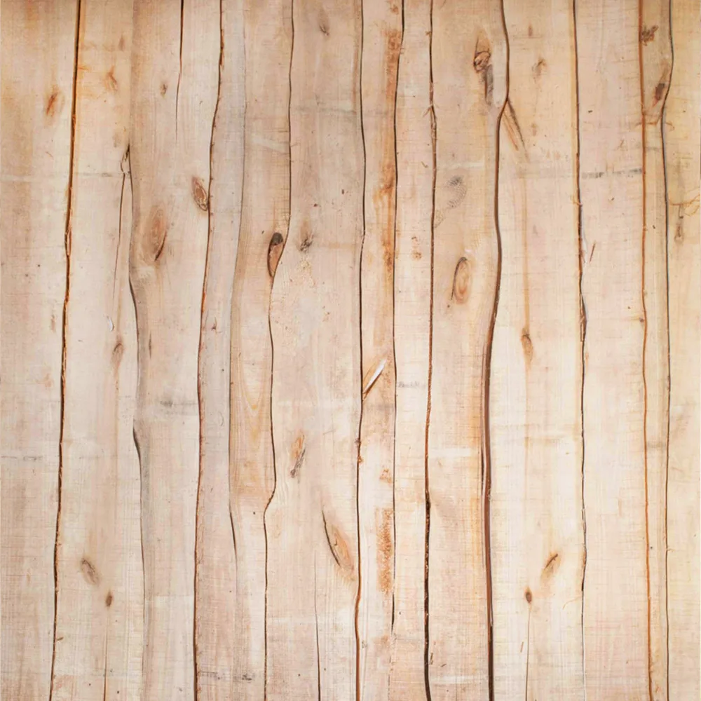 Close-up of an assembled panel where irregular live-edge boards interlock seamlessly